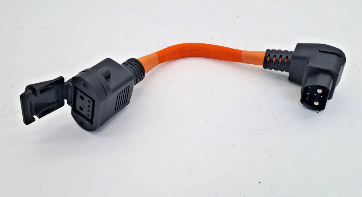 Adapter plug for new battery and old charger